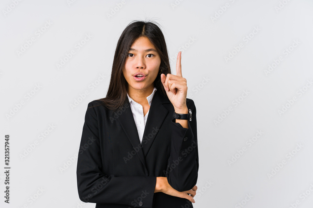 Young asian business woman having some great idea, concept of creativity. Young asian business woman having some great idea, concept of creativity.