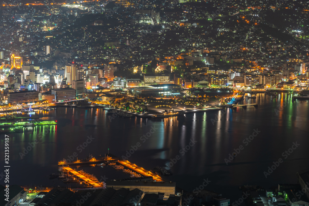Nagasaki city light up at night. Panorama nightscape from Mt Inasa observation platform deck. Famous beauty scenic spot in the world, the 10 ten million dollar night views. Nagasaki Prefecture, Japan