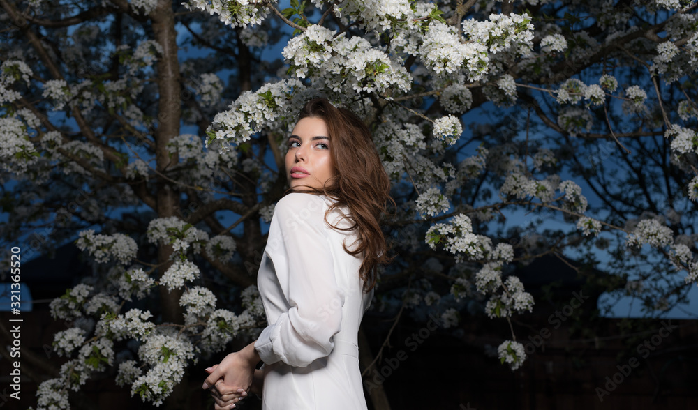 Portrait of beautiful young girl in summer garden. Portrait of beautiful young girl in summer garden.