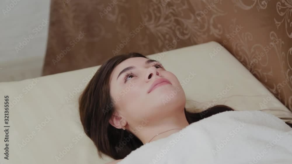 Beautiful young girl on a couch in a beauty salon. Beautiful young girl on a couch in a beauty salon.