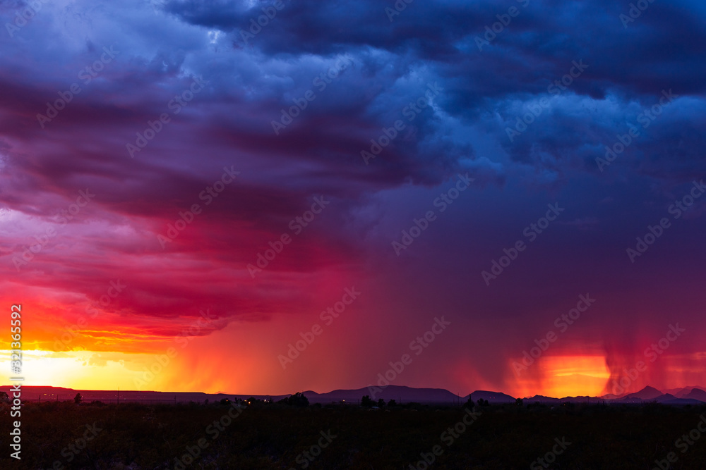 Colorful sunset sky with dramatic storm clouds