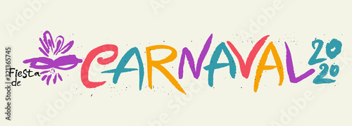Carnaval de fiesta 2020 calligraphy horizontal banner. Vector logo. Grunge pattern with handwritten lettering and carnival mask. © difinbeker