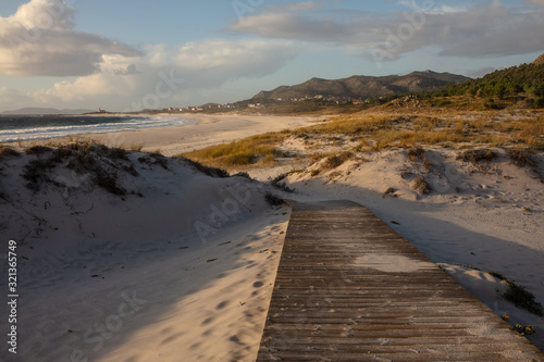 wooden walkway to the sea