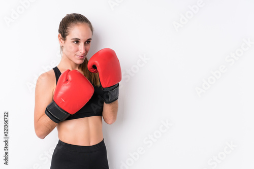 Young caucasian sporty woman boxing © Asier