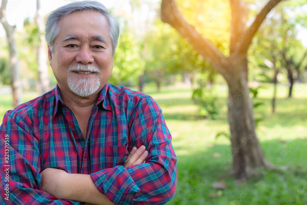 Handsome Senior asian man. Attractive handsome elderly man cross arms. Old man has good health, strong. Senior guy is retirement age. His terminal is stable of life. Grandfather get happy, enjoy life. Handsome Senior asian man. Attractive handsome elderly man cross arms. Old man has good health, strong. Senior guy is retirement age. His terminal is stable of life. Grandfather get happy, enjoy life.