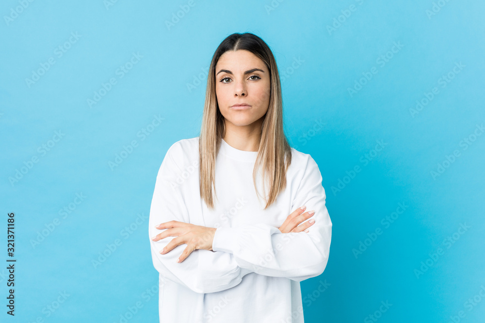 Young caucasian woman isolated unhappy looking in camera with sarcastic expression. Young caucasian woman isolated unhappy looking in camera with sarcastic expression.