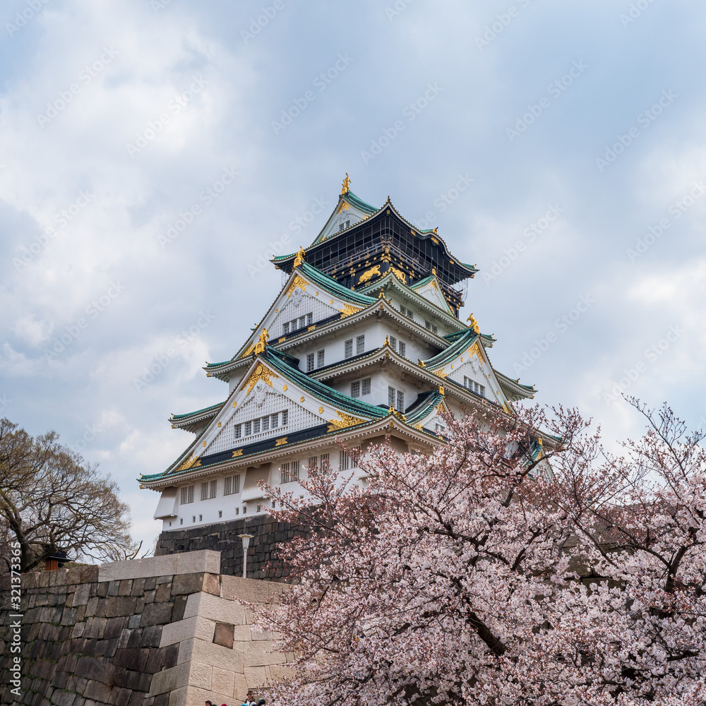 Osaka castle with cherry blossom. Japanese spring beautiful scene. Osaka castle with cherry blossom. Japanese spring beautiful scene.