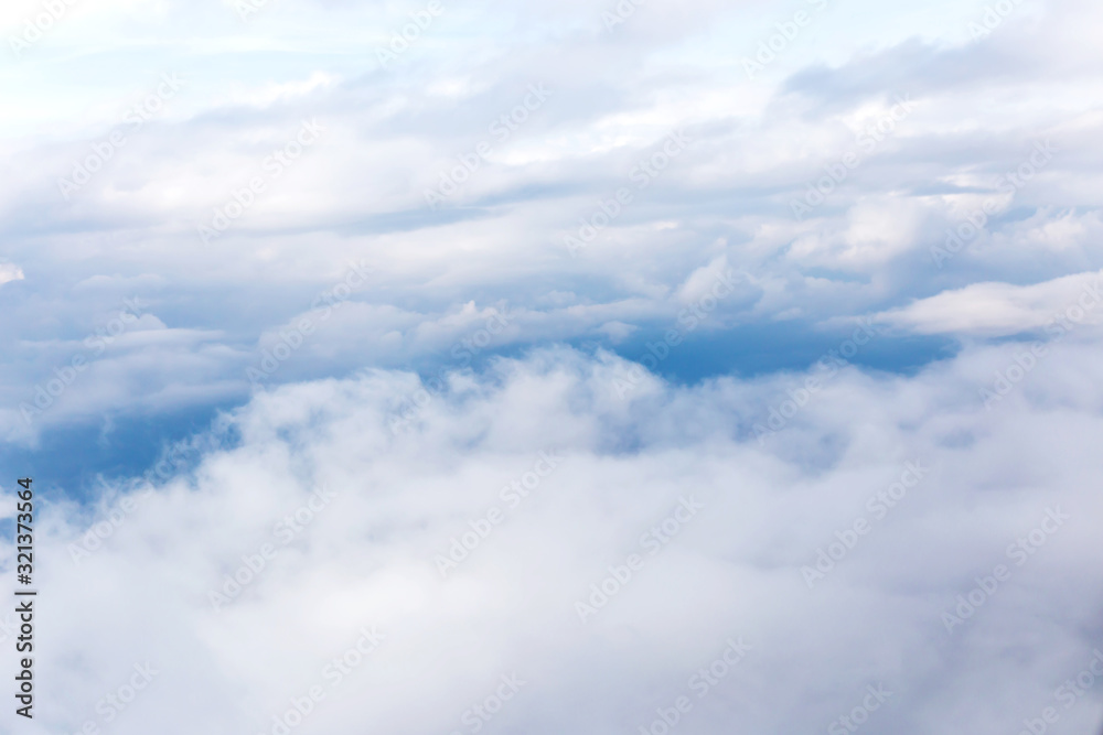 clouds and blue sky seen from plane