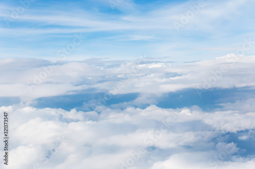 clouds and blue sky seen from plane © suwatwongkham