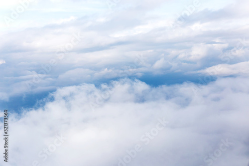 Fototapeta Naklejka Na Ścianę i Meble -  clouds and blue sky seen from plane