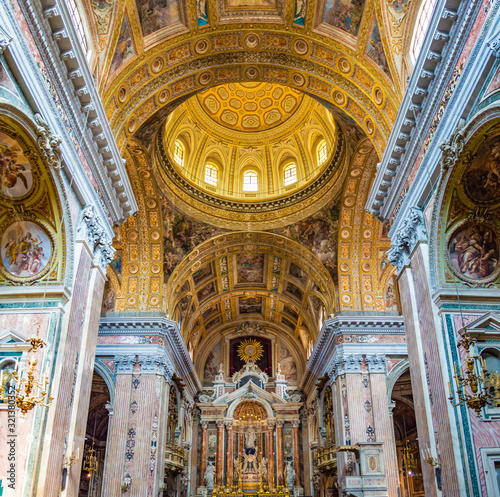 Naples, Italy - CIRCA 2013: The interior and dome of Gesù Nuovo (New Jesus).