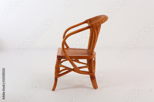 In some Asian countries and China  craftsmen use cane or wicker furniture on a white background. It can make people relaxed and happy. Usually this material can be used for backrest  rocking chair  ta