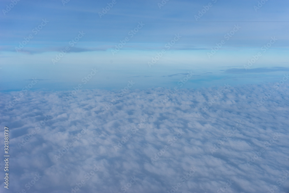 Amsterdam Schiphol,, a group of clouds in the sky