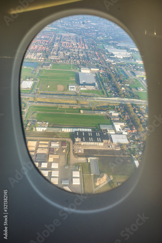 Amsterdam Schiphol,, a side view mirror of a car