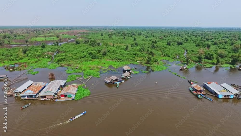 Amazing View Of Kompong Kleang River Village From Houses in Stilts To Aquatic Plants - aerial view Amazing View Of Kompong Kleang River Village From Houses in Stilts To Aquatic Plants - aerial view