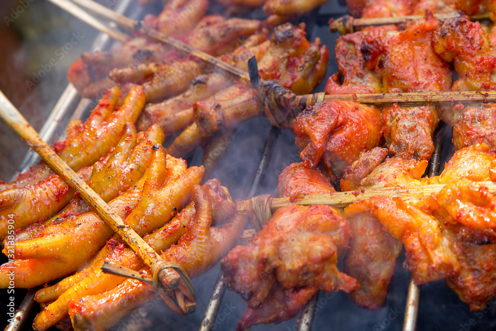 Close up of Roast or Grilled Chicken, Thai street food favorites.