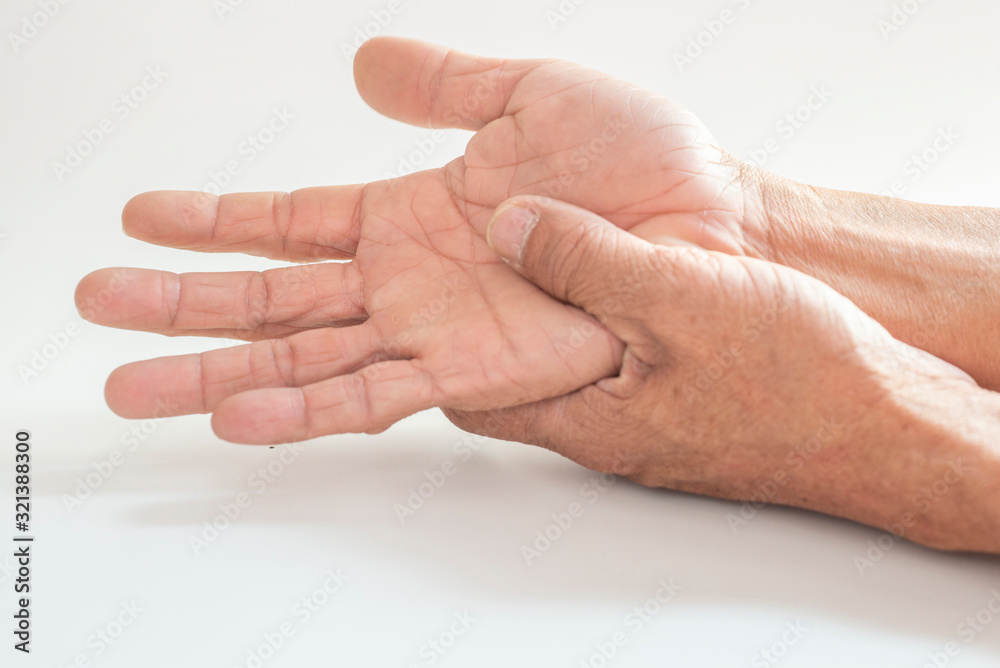 The hands and fingers of people Old with a problem showing sickness on a white background The hands and fingers of people Old with a problem showing sickness on a white background
