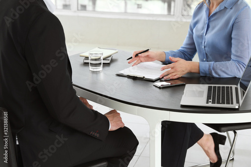 Bank manager working with w...