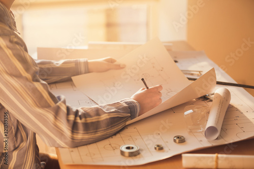 Female architect working in...
