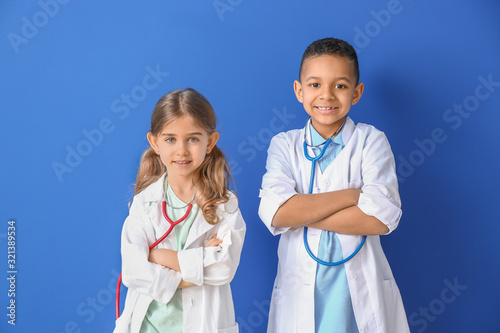 Cute little doctors on colo...