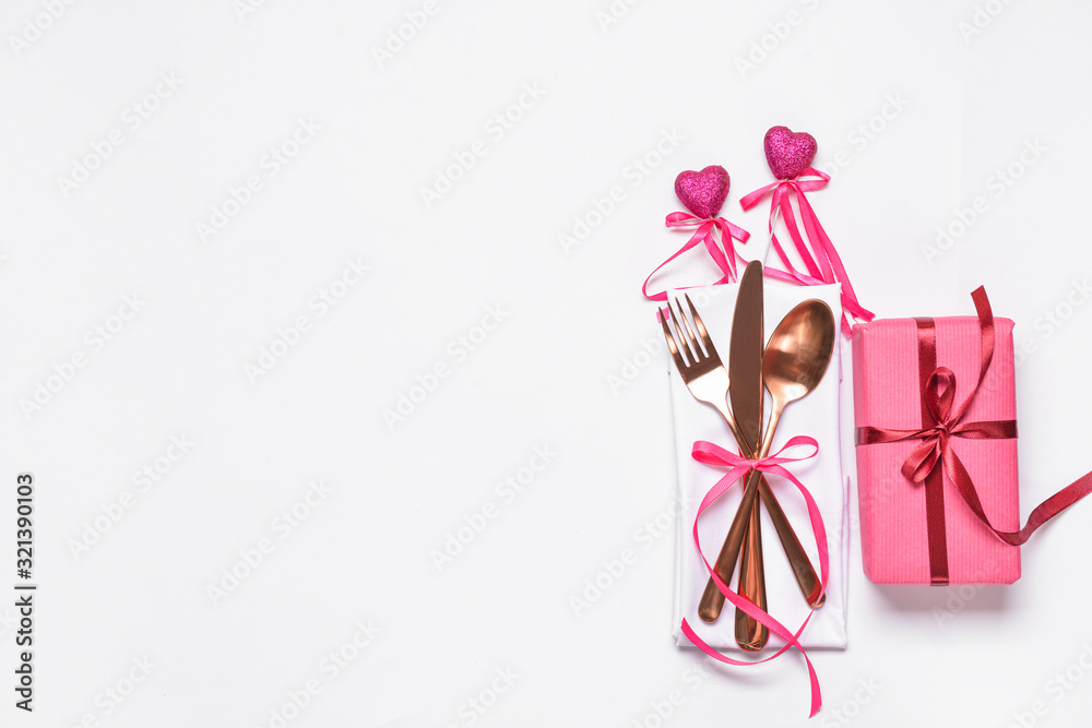 Beautiful table setting for Valentine's Day on white background Beautiful table setting for Valentine's Day on white background