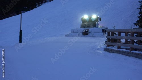 Snow Groomer passing By in Park City Utah photo