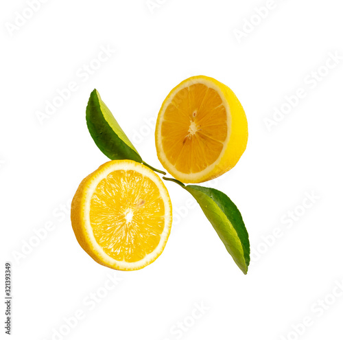Fresh yellow ripe lemon fruits half sliced and green leaf isolated on white background  die cut with clipping part