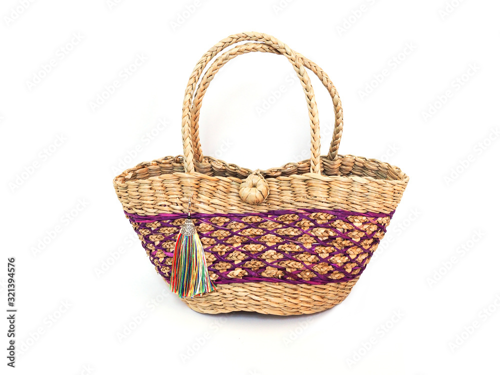 Handmade krajood bag made with natural bulrush plants. Thai style handbag. Isolated on white background. Handmade krajood bag made with natural bulrush plants. Thai style handbag. Isolated on white background.