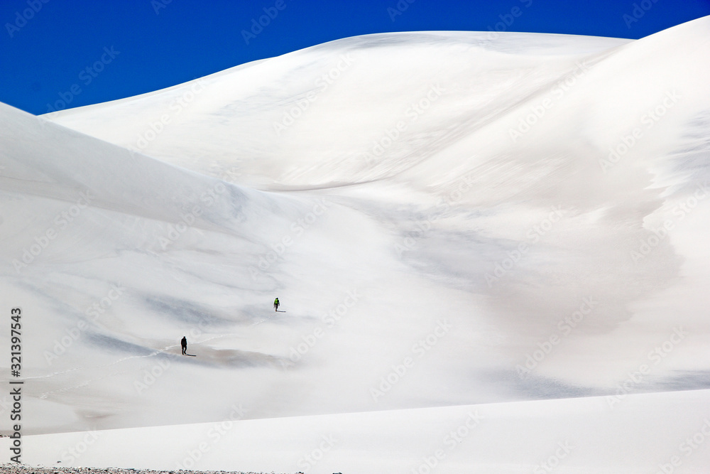 White dune at the lava field of the volcano Caraci Pampa at the Puna de Atacama, Argentina