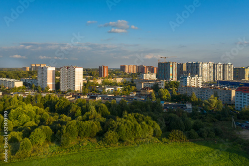 LOBNYA, MOSCOW REGION - AUGUST 31, 2019: Aerial view of the residential buildings of the city of Lobnya. Late bright summer evening photo