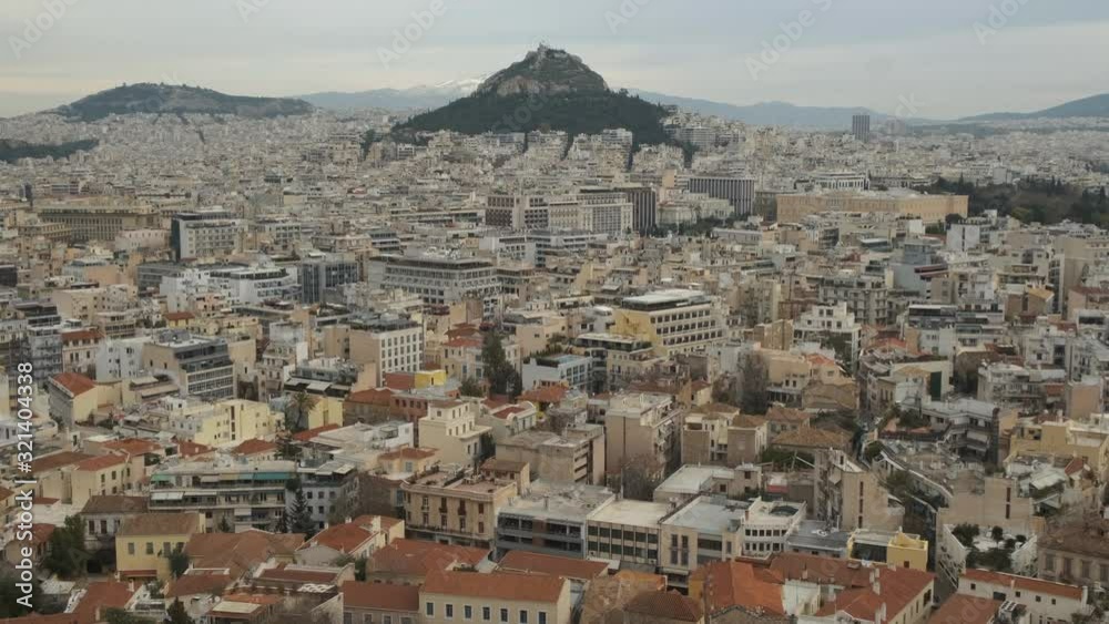 Aerial tilt down shot of the Mt Lycabettus and the city of Athens Aerial tilt down shot of the Mt Lycabettus and the city of Athens