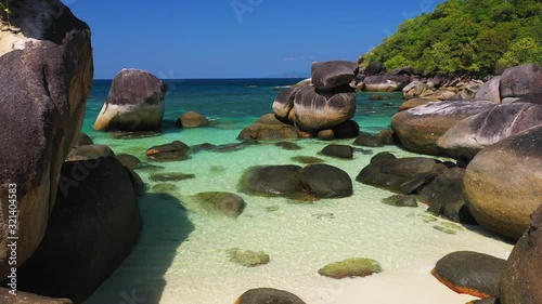 Footage B-roll of Aerial view drone shot ocean waves, Beautiful tropical beach and rocky coastline and beautiful forest. Nga Khin Nyo Gyee Island Myanmar. Tropical seas and islands in southern Myanmar photo