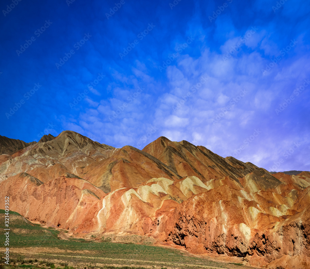 Fototapeta premium Zhangye Danxia geological layers sunset. rainbow mountains in Gansu Province. China landscape at Zhangye Danxia national geological park. 