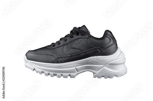 Black sneaker with white sole. Sport shoes.