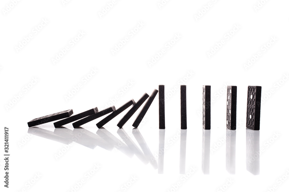 Chain reaction of domino blocks falling down Chain reaction of domino blocks falling down