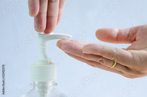 Hand using alcohol gel anti bacteria and virus.