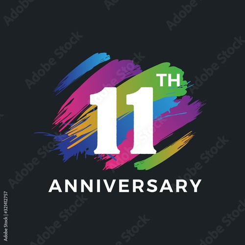 11 years anniversary logo with colorful brushstroke backgrounds