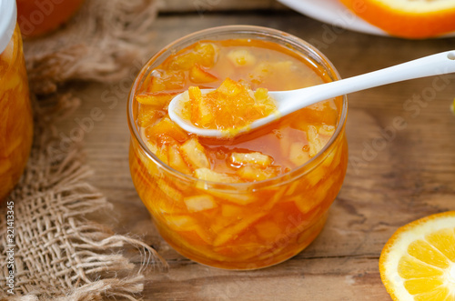 Tasty homemade orange jam and slice of orange fruit