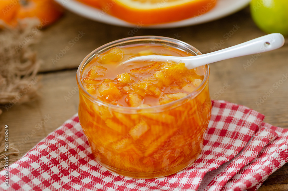 Tasty homemade orange jam and slice of orange fruit Tasty homemade orange jam and slice of orange fruit