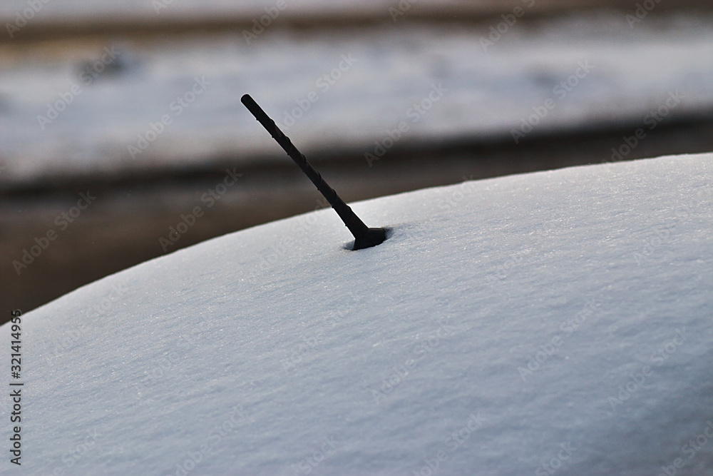 fresh snow on the car in the winter morning fresh snow on the car in the winter morning