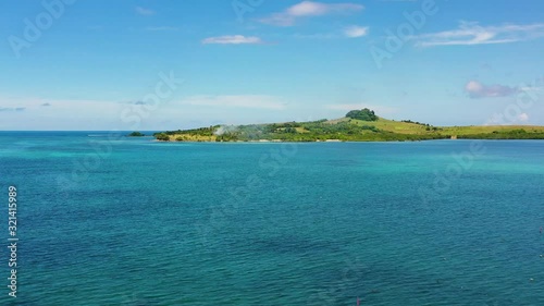 Wallpaper Mural Basot Island. Tropical island with green hills, aerial view. Torontodigital.ca