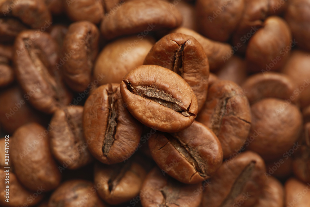 Obraz premium Roasted coffee beans close up. Espresso dark, aroma, black caffeine drink