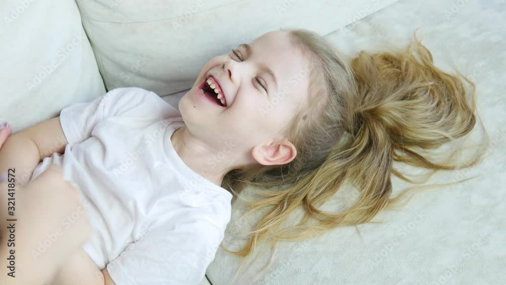Young mom fun enjoy weekend leisure time with cute little girl child tickle Young mom fun enjoy weekend leisure time with cute little girl child tickle