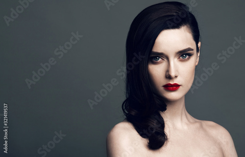 Beautiful face of a glamour woman with bright make up