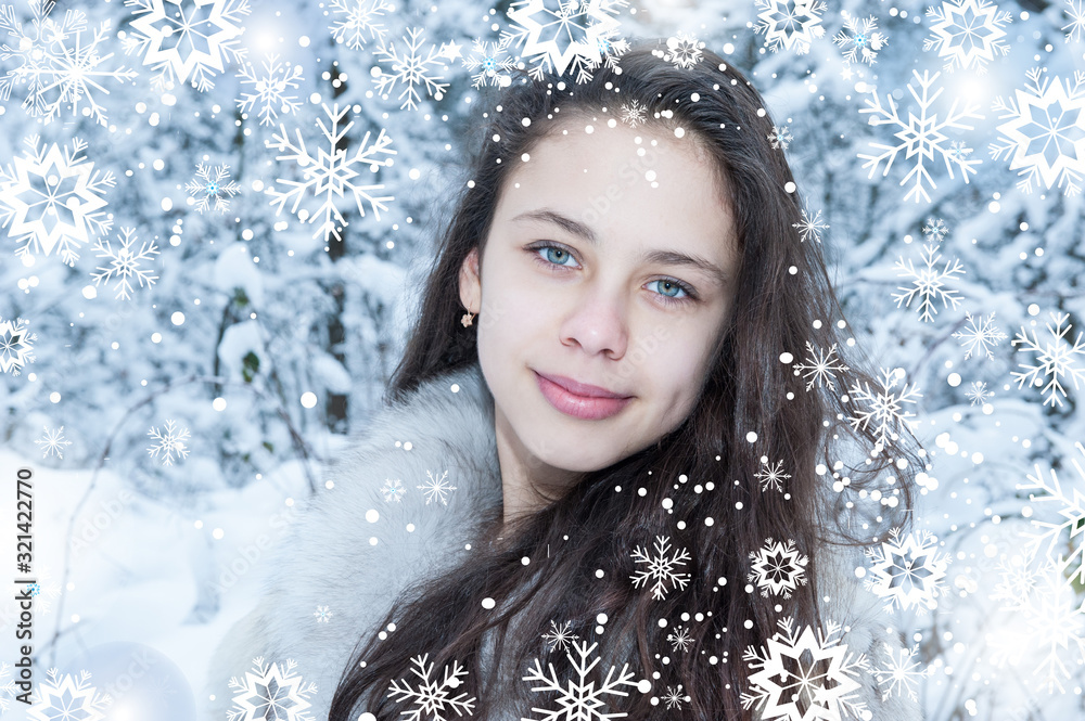 Teen girl in a snowy forest