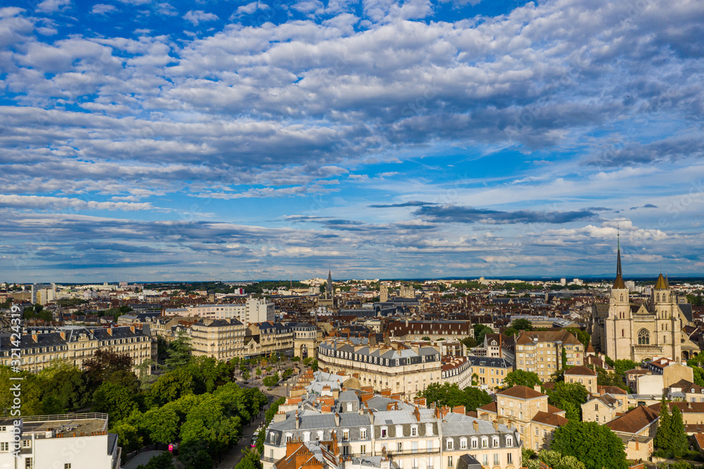 Beautiful historical town Dijon, France under summer blue sky