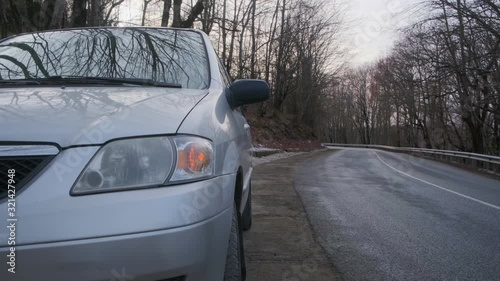 Wallpaper Mural The car stands on the side of the road and blinks a yellow emergency light. Torontodigital.ca