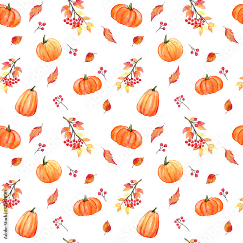 Seamless watercolor autumn pattern with rowan berries, fall leaves and pumpkins on the white background