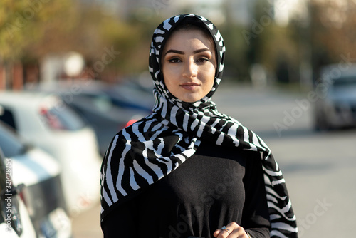 Portrait of serious modern young muslim woman