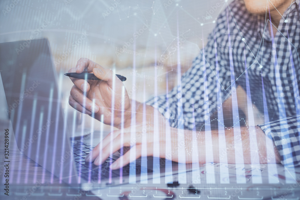 Double exposure of forex graph with man working on computer on background. Concept of market analysis. Double exposure of forex graph with man working on computer on background. Concept of market analysis.